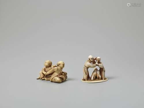 TWO IVORY NETSUKE OF BLINDMEN