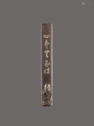 AN IRON AND GOLD KOZUKA HANDLE DEPICTING DARUMA