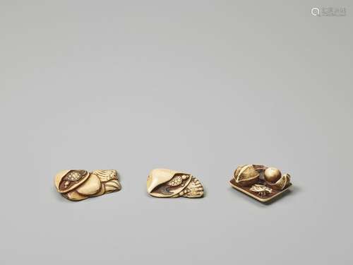 A GROUP OF THREE STILL LIFE IVORY NETSUKE