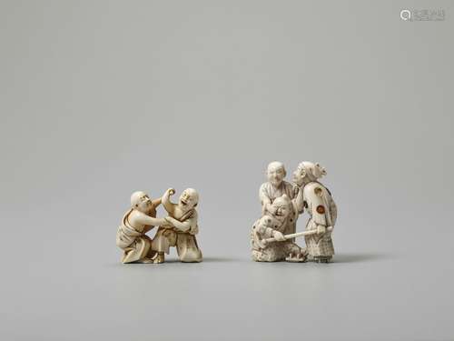 TWO IVORY NETSUKE OF BLIND MEN FIGHTING