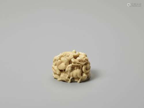 AN IVORY NETSUKE OF THE TWELVE ANIMALS OF THE ZODI…