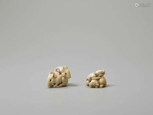 TWO IVORY NETSUKE OF TWO PIEBALD RATS AND TWO PUPP…