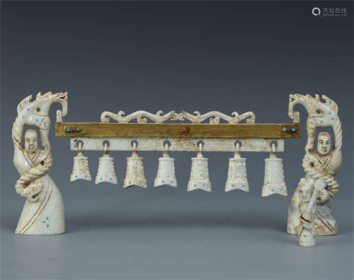 A GROUP OF CHINESE JADE BELLS WITH FIGURES DRAGON FRAME