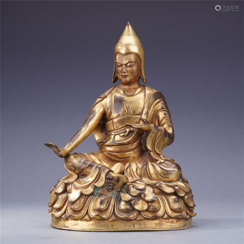 TIBETAN GILT BRONZE SEATAED GURU