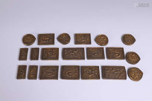 A SET OF TWEENTY PIECES OF CHIENSE GILT BRONZE BELT PLAQUES