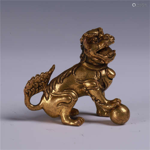 CHINESE GILT BRONZE LION WITH BALL TABLE ITEM