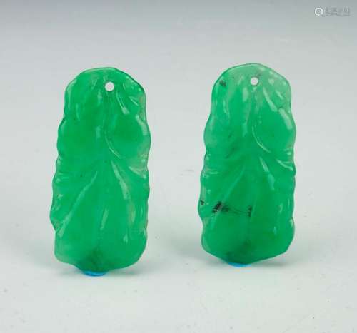 PAIR OF MATCHING JADE PENDANTS