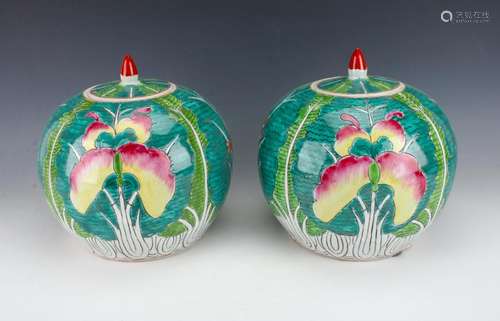 PAIR OF LIDDED CABBAGE LEAF JARS