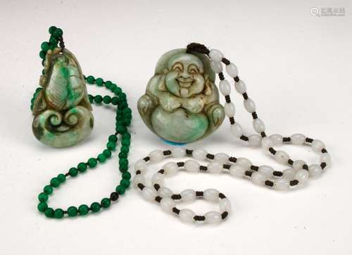 TWO JADE PENDANTS