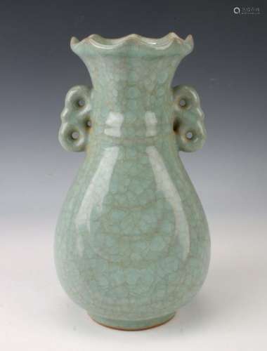 CELADON VASE WITH DRAPED DECORATION AND HANDLES