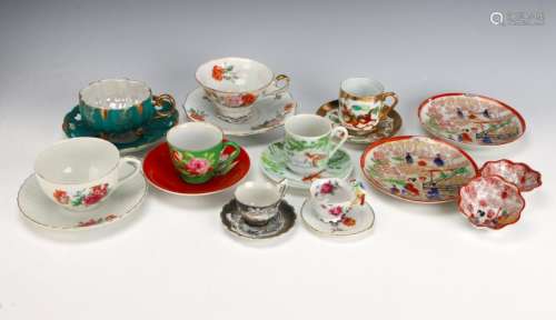 EIGHT CHINESE AND JAPANESE CUPS AND SAUCERS