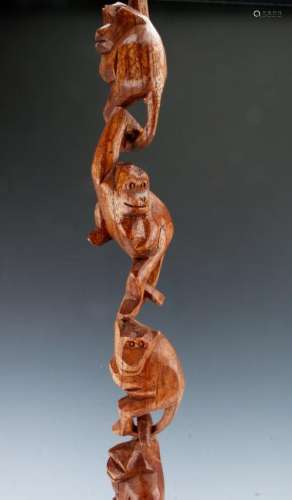 EIGHT WOODEN CARVED HANGING MONKEYS