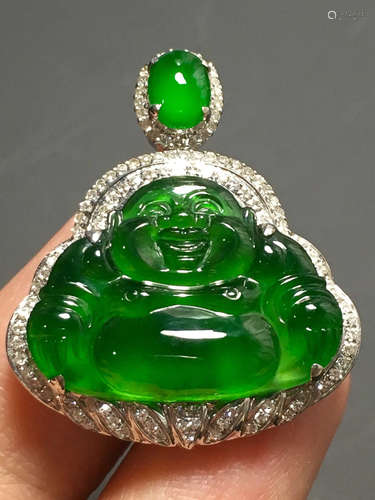 A GREEN JADEITE CARVED 