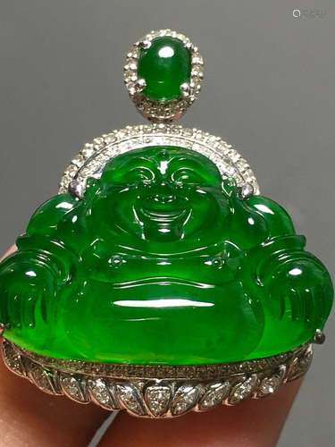 A GREEN JADEITE CARVED 