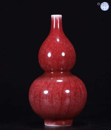 A RED GLAZE GOURD BOTTLE