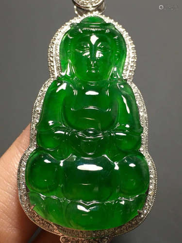 A GREEN JADEITE CARVED 