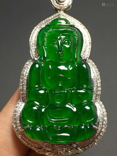 A GREEN JADEITE CARVED 