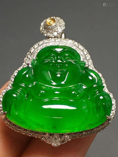 A GREEN JADEITE CARVED 