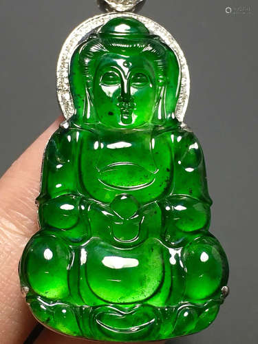 A GREEN JADEITE CARVED 