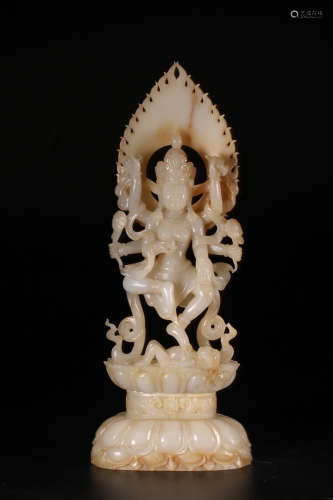 A HETIAN JADE SIX ARMS GUANYIN FIGURE