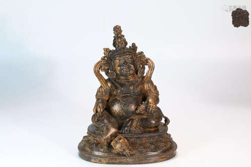 A GILT BRONZE GOD OF WEALTH BUDDHA