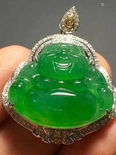 A GREEN JADEITE CARVED 