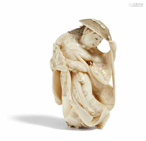 EXQUISITES NETSUKE DER BERÜHMTEN TÄNZERIN IZUMO NO OKUNI. Japan. Tôkyô, um 1900. Kawahara Ryo.