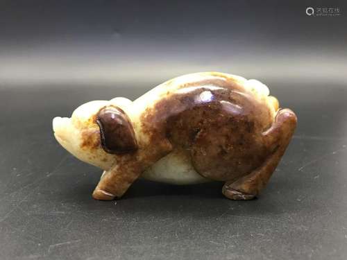 A CARVED JADE PIG .ANTIQUE