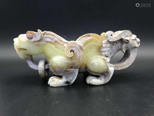 A CARVED YELLOW JADE BEASTS.ANTIQUE