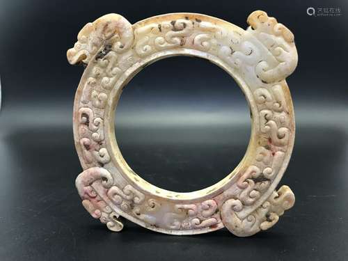 A CARVED JADE 'DRAGON' BI.ANTIQUE