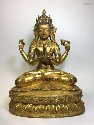 A GILT-BRONZE FIGURE OF AVALOKITESVARA.QING DYNASTY