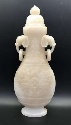 A WHITE JADE CARVING OF ELEPHANT HEAD VASE AND