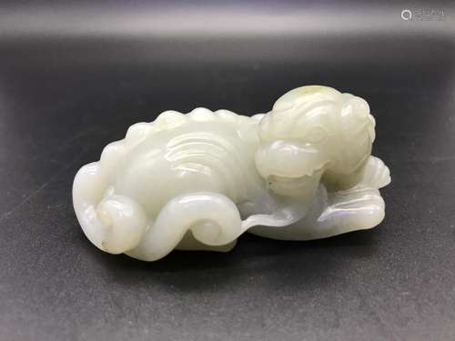 A CARVED WHITE JADE BEAST.ANTIQUE