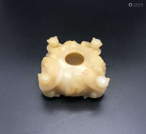 A CARVED JADE 'BOYS' WASHER.ANTIQUE