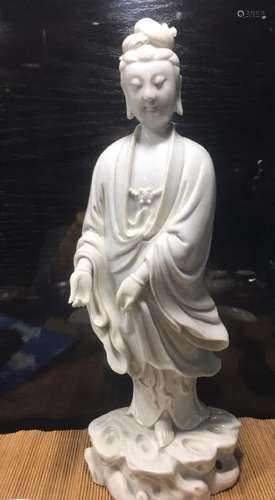 A CARVED DEHAU GUANYIN.ANTIQUE