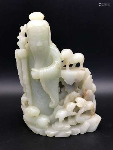 A CARVED WHITE JADE SCHOLAR.ANTIQUE