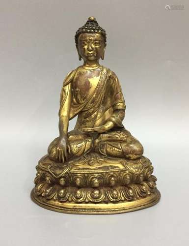 A GILT-BRONZE FIGURE OF SAKAYAMUNI.16th  CENTURY.