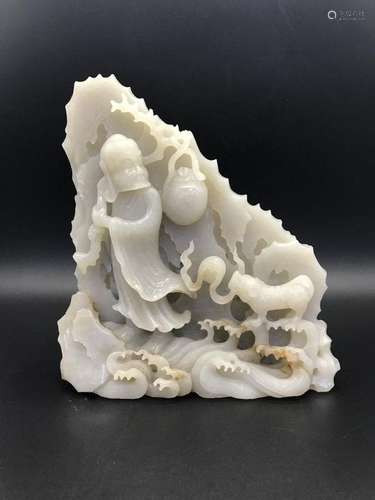 A WHITE JADE CARVING OF