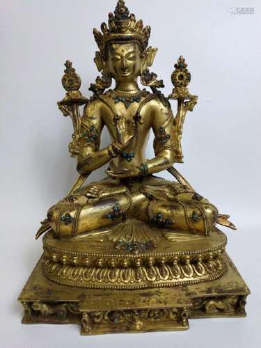 A GILT-BRONZE FIGURE OF AMOGHASIDDHI BUDDHA.MING