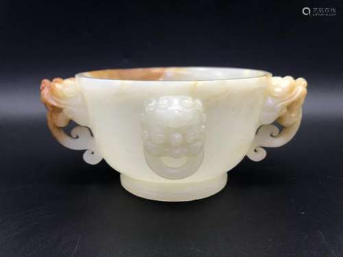 A CARVED JADE LIONHEAD BOWL.ANTIQUE