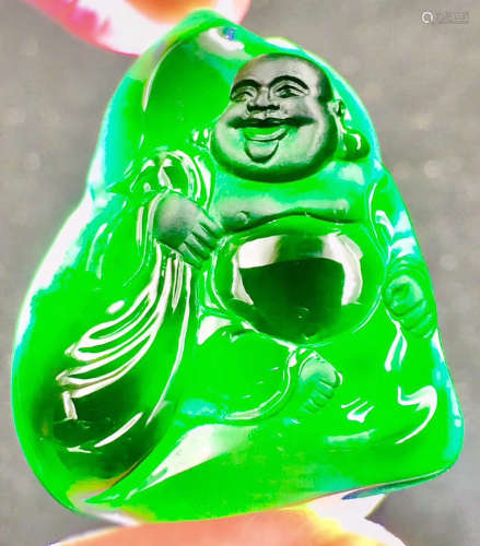 A BLACK AND GREEN JADEITE BUDDHA FIGURE PENDANT