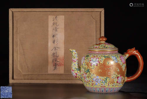 A QIANLONG MARK YELLOW BACK GROUND FAMILLE ROSE  DRAGON PATTERN HANDLE POT