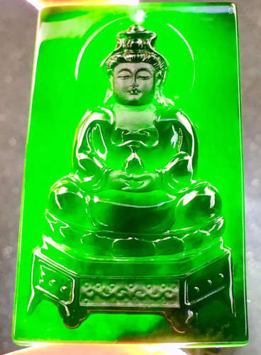 A BLACK AND GREEN JADEITE'GUANYIN' FIGURE PENDANT