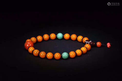 A TIBETAN AMBER AND TURQUOISE BRACELET