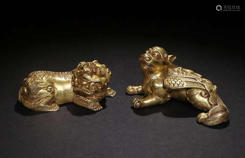 A PAIR OF GILT BRONZE PAPERWEIGHTS