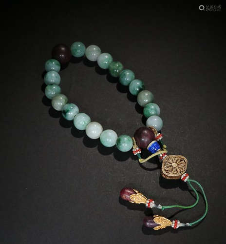 A JADEITE EIGHTEEN BEAD HAND PIECE