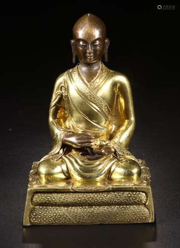 A GILT BRONZE TIBETAN GURU