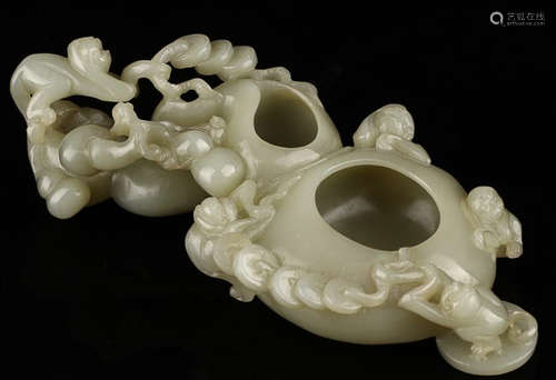 A HETIAN GREEN JADE DOUBLE WASHER