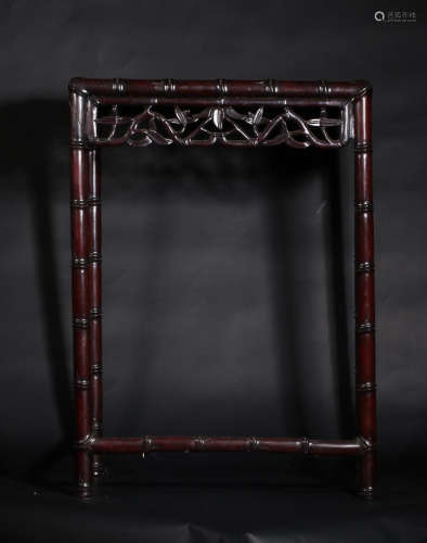 A RED WOOD BAMBOO SHAPED SQUARE STAND