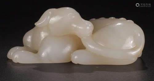 A HETIAN JADE DOG ORNAMENT